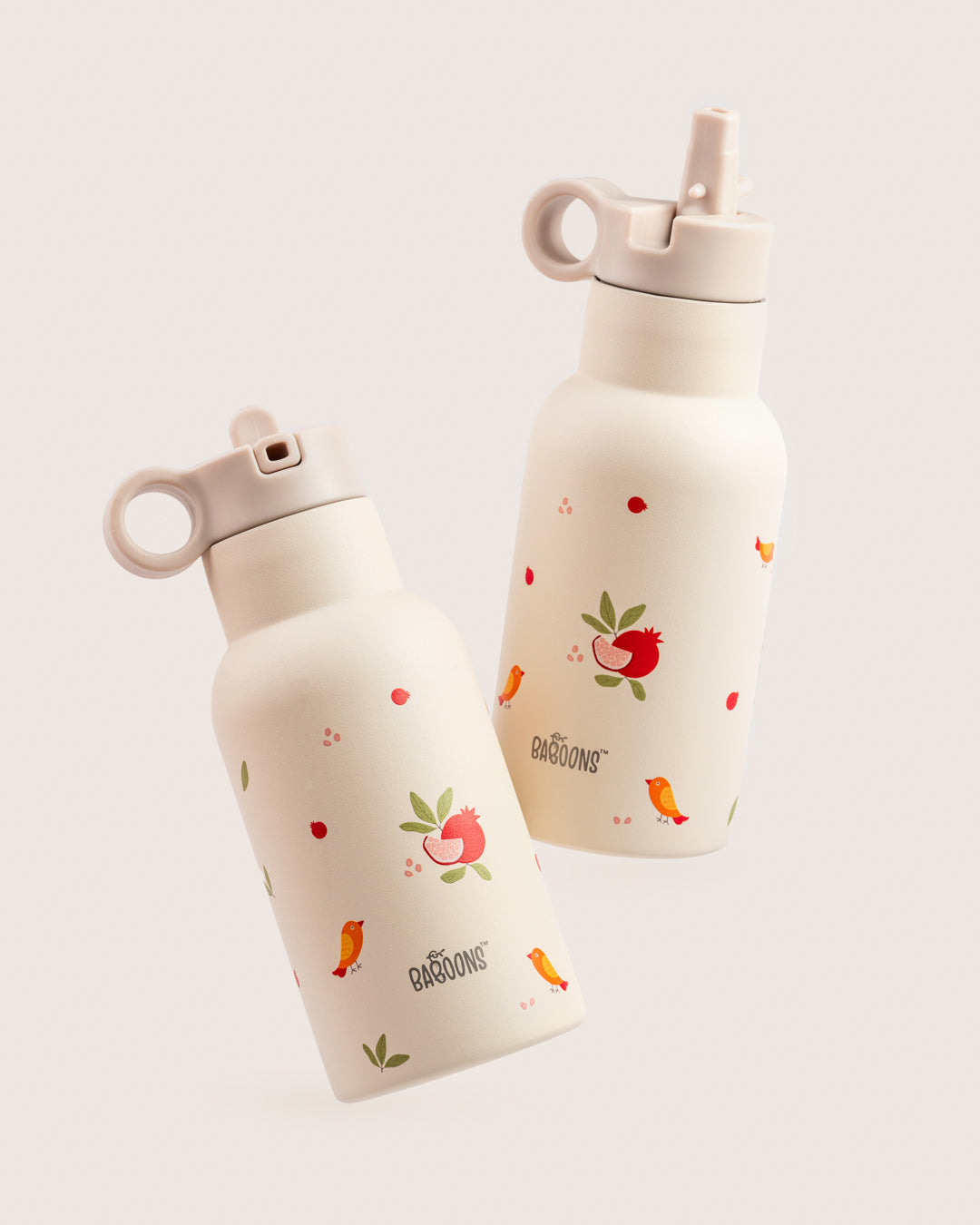 350ml Stainless Steel Double Walled Insulated Water Bottle with Pomegranate Design for Kids in India - Floating Shot