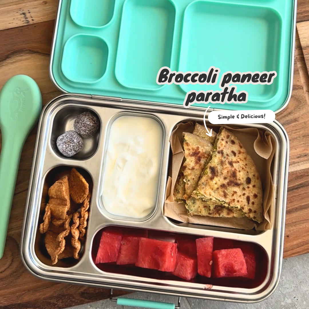 Kid-friendly broccoli paneer paratha meal arranged in a leakproof stainless steel Baboons lunchbox.