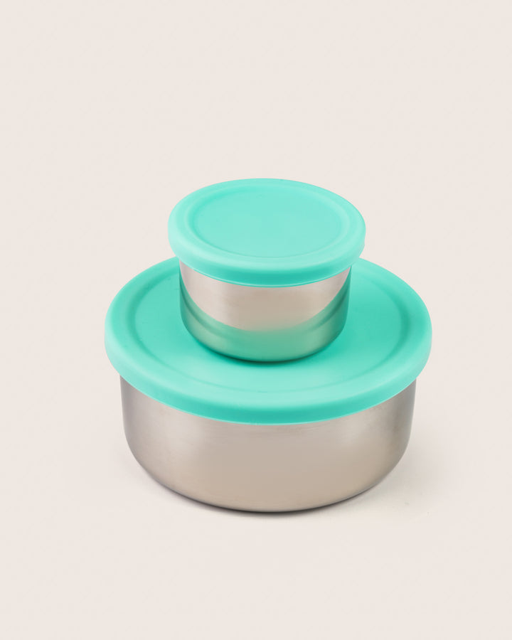 Large and small stainless steel snack containers with aqua silicone lids, ideal for bento lunch boxes in India