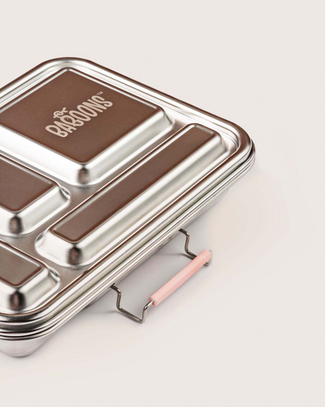 Bento Five stainless steel lunchbox with pink silicone compartments, closed angle latch view