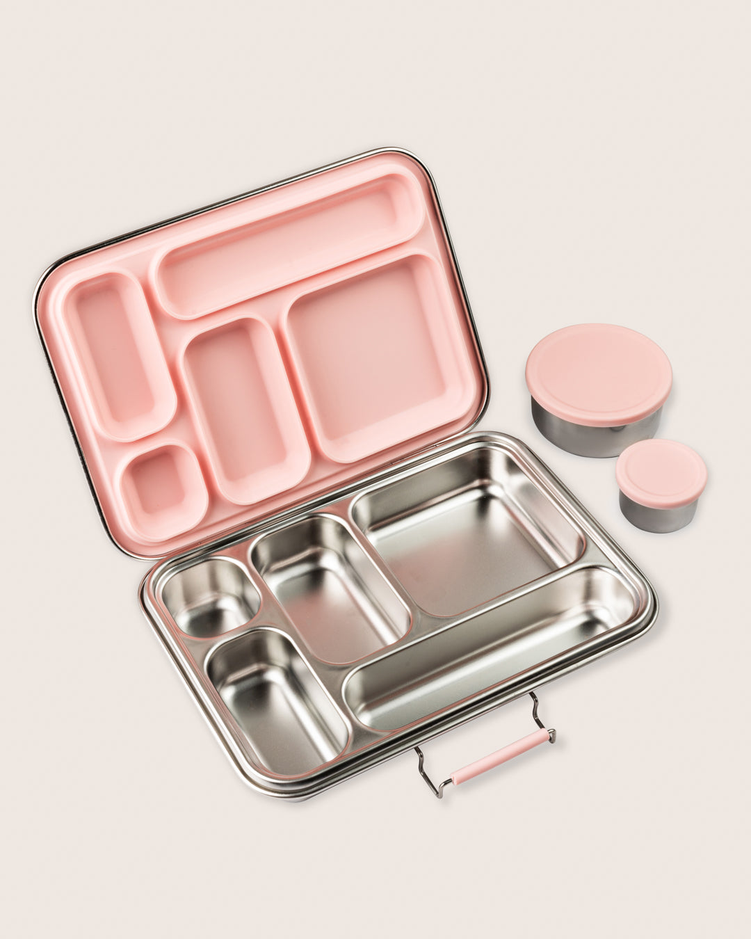 Bento Five leakproof stainless steel lunchbox with pink silicone compartments and snack container set on the side