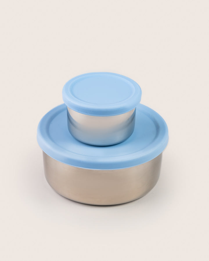 Stainless steel snack container set with blue silicone lids, featuring a large and a small container, ideal for keeping snacks fresh in India